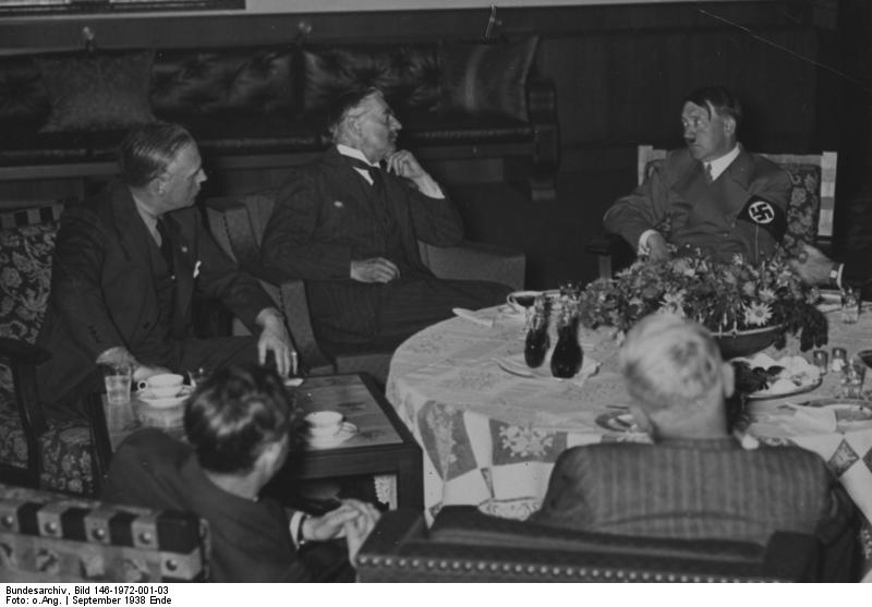 British prime minister Neville Chamberlain, Joachim von Ribbentrop and Adolf Hitler at dinner during Chamberlain's 1938 appeasement visit to Munich